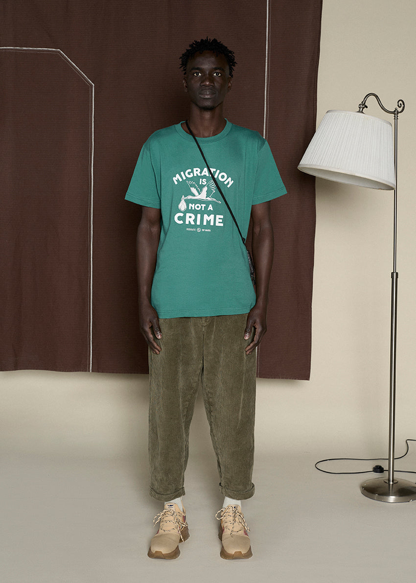 Camiseta MIGRATION IS NOT A CRIME