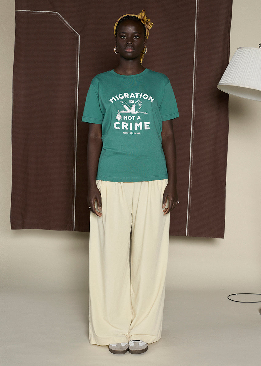 Camiseta MIGRATION IS NOT A CRIME
