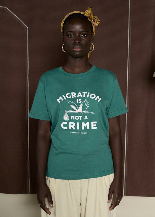Camiseta MIGRATION IS NOT A CRIME